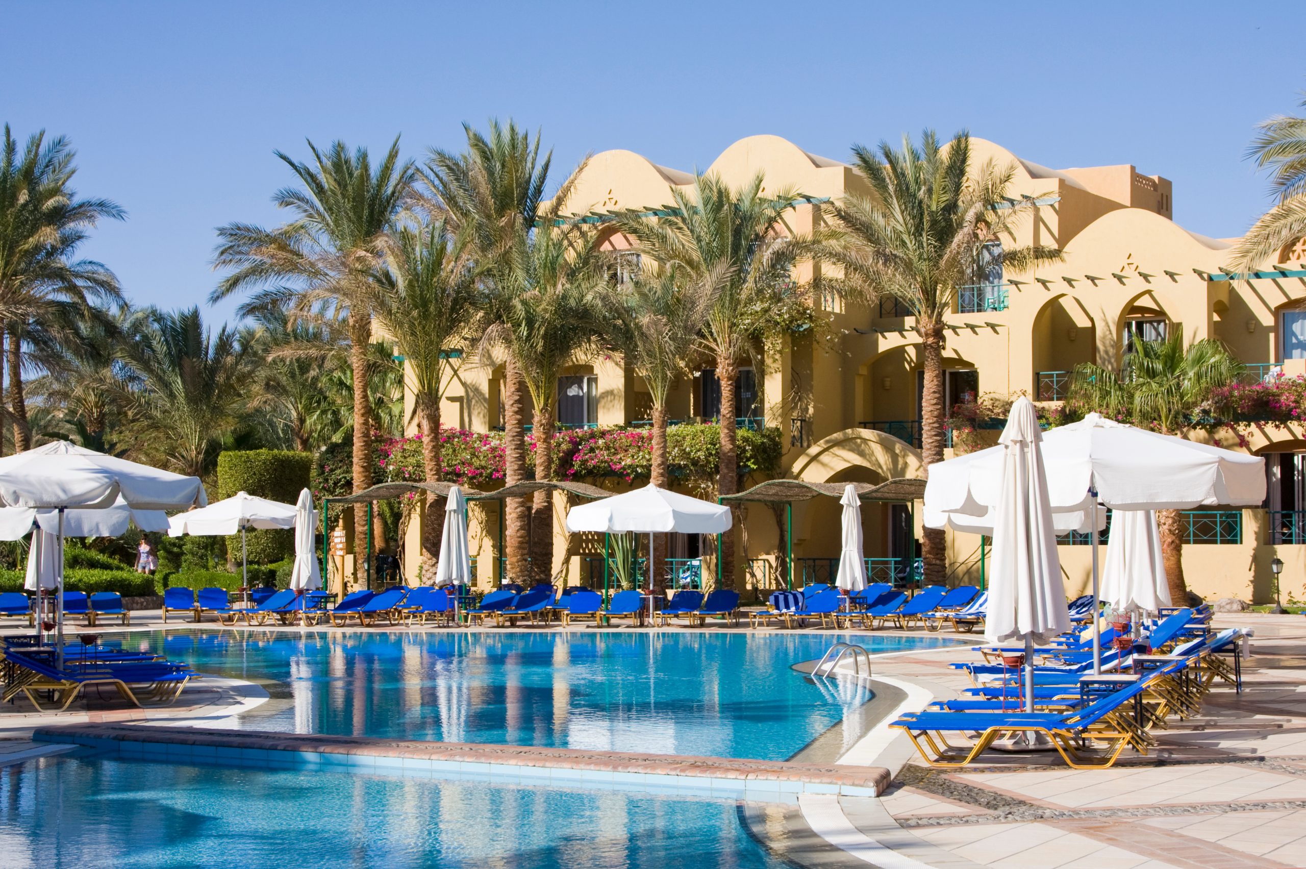 Swimming pool on a sunny day. Hurghada city in Egypt.